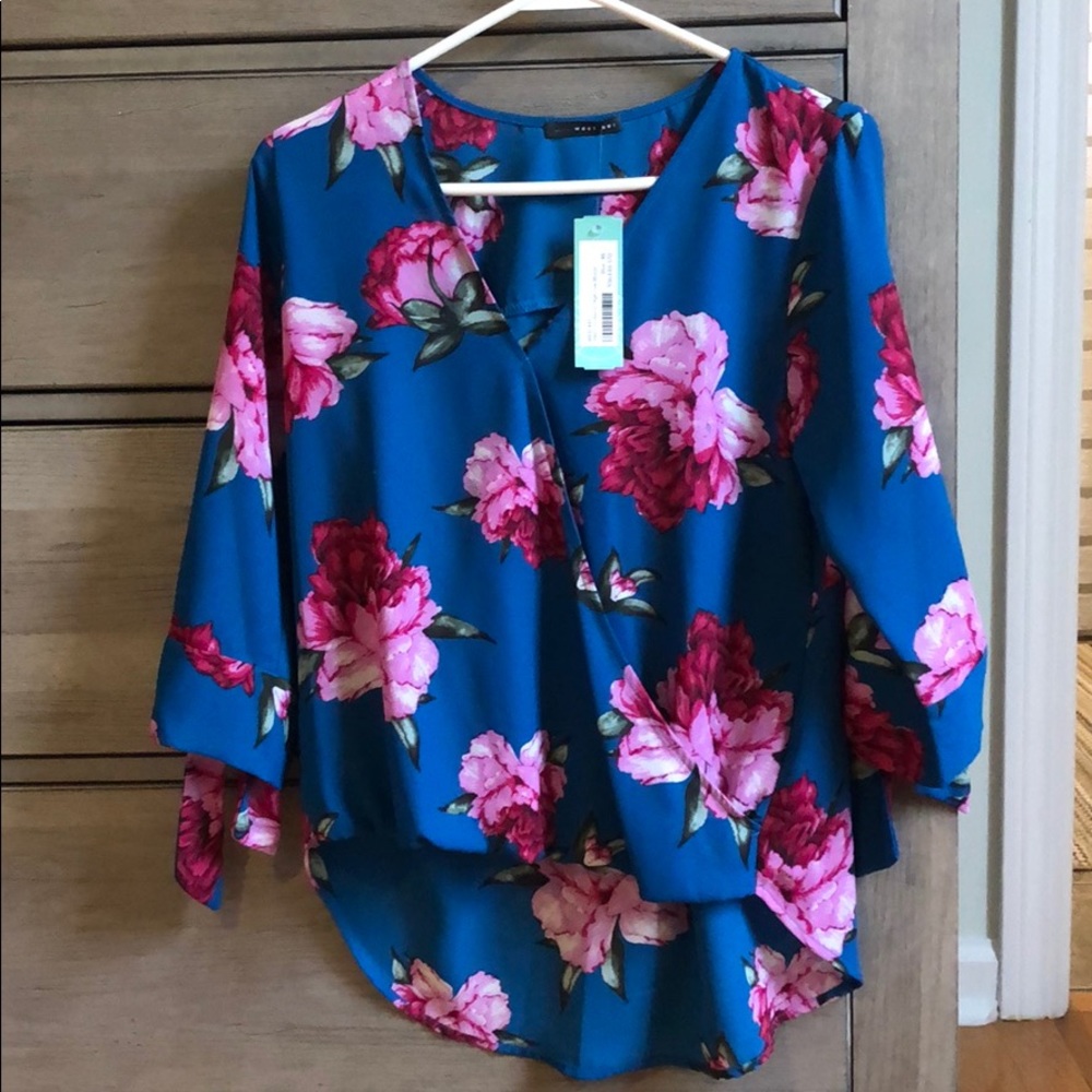 Flowered blouse.